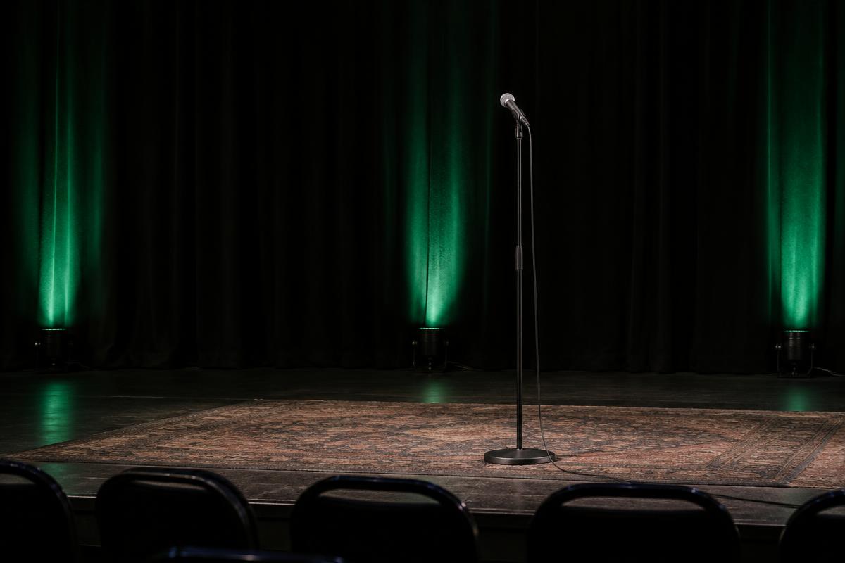 Microphone on an intimate stand-up comedy stage